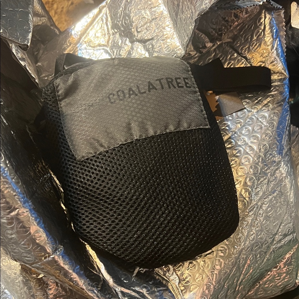 Black Coalatree packable backpack never used still with tag.